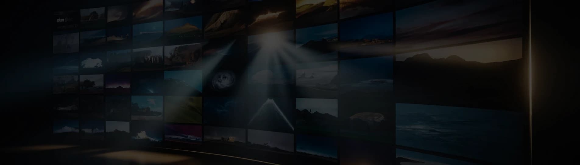Wall of glowing TV screens